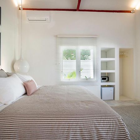 Ria Uluwatu, Tropical Chic Hotel Bagian luar foto