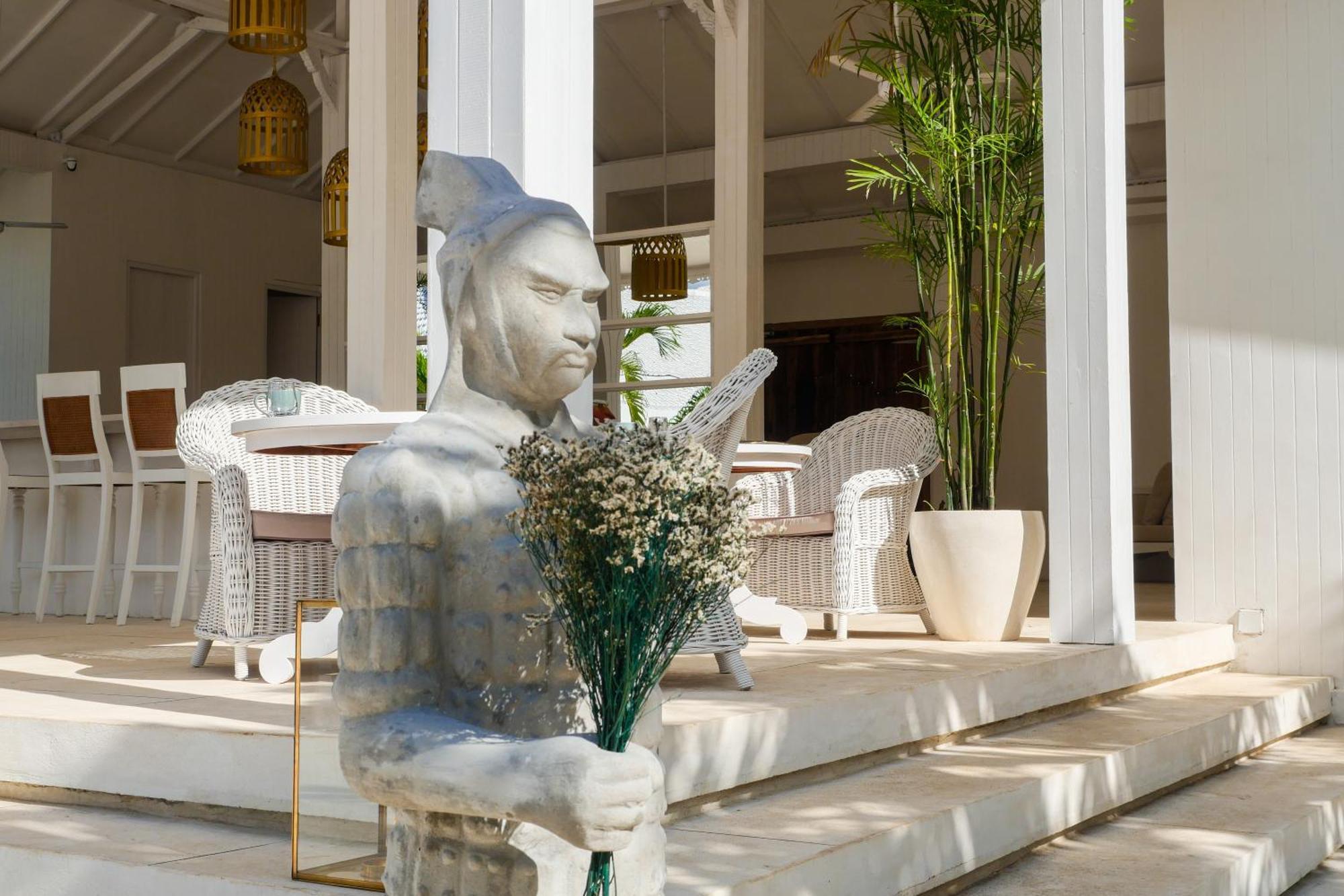 Ria Uluwatu, Tropical Chic Hotel Bagian luar foto