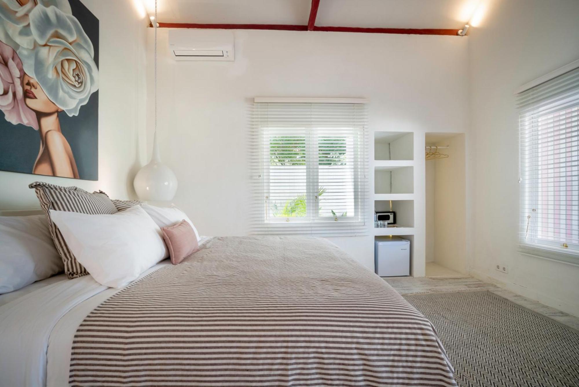 Ria Uluwatu, Tropical Chic Hotel Bagian luar foto