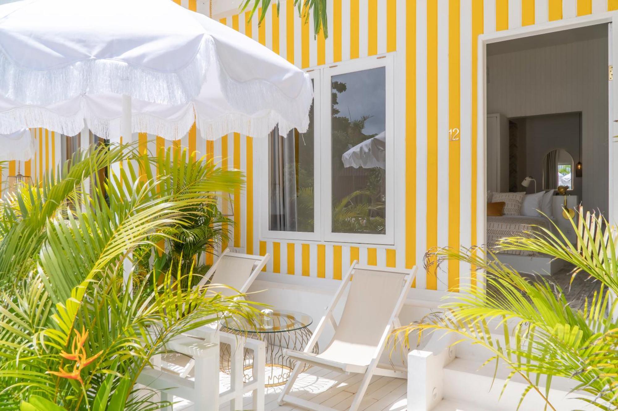 Ria Uluwatu, Tropical Chic Hotel Bagian luar foto