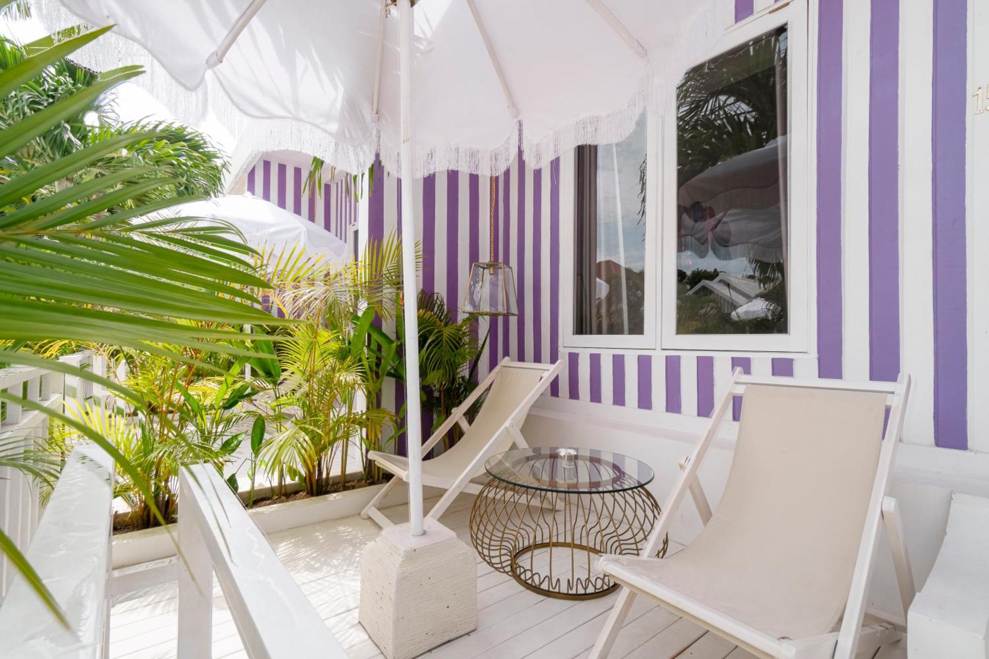 Ria Uluwatu, Tropical Chic Hotel Bagian luar foto